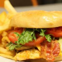 Grilled Chicken American Sandwich · Half a pound of chicken breast char-grilled topped with bacon and American cheese served on ...