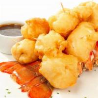 Tempura Fried Lobster Tail · Four or eight ounce lobster tail fried in tempura batter and cut into 6 or 8 pieces respecti...