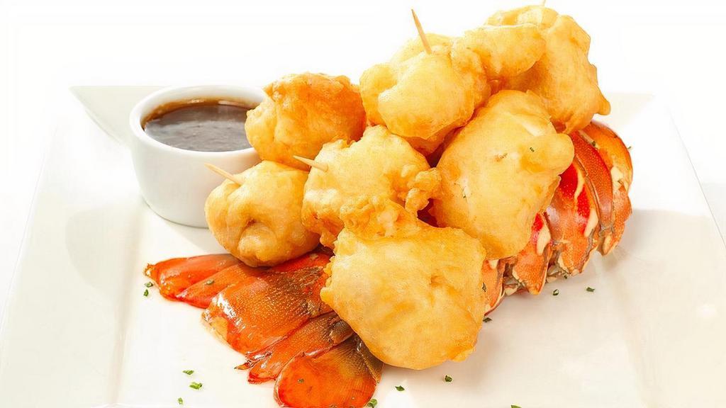Tempura Fried Lobster Tail · Four or eight ounce lobster tail fried in tempura batter and cut into 6 or 8 pieces respectively. Served with a side of Miso butter sauce.