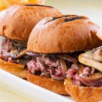 Filet Sliders 79 · Beef tenderloin with sautéed mushrooms and red onions & topped with Swiss cheese. Served on ...