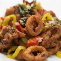 Cherry Pepper Calamari · Squid lightly breaded in seasoned breadcrumbs, flash fried and tossed with sautéed banana pe...