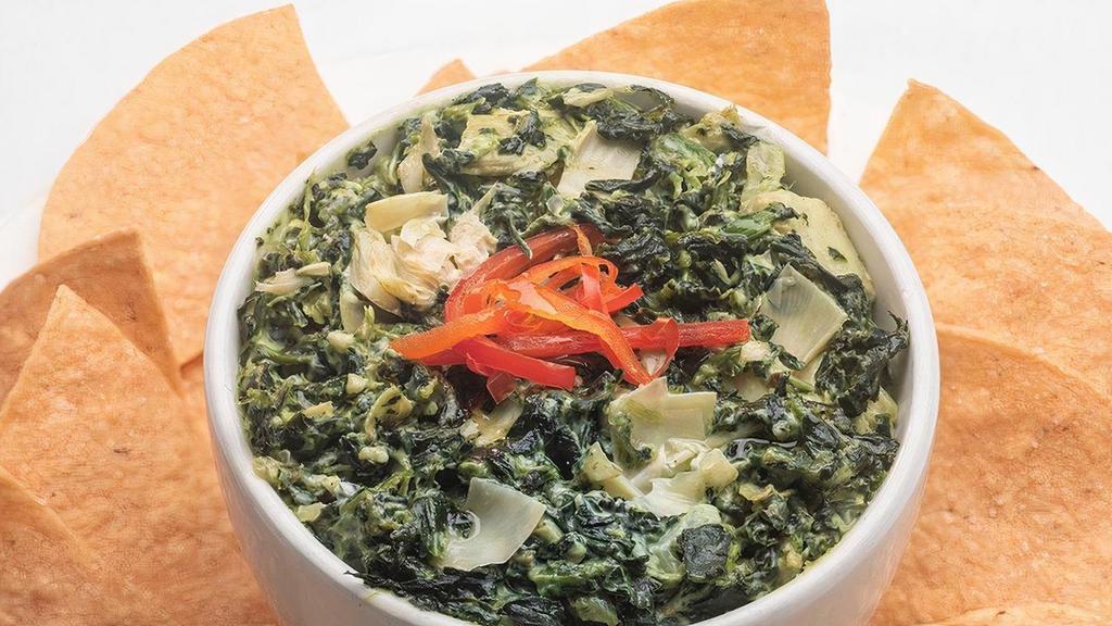 Truffle Spinach & Artichoke Dip | Ve · Spinach and artichoke folded into a creamy sauce with cream cheese, gorgonzola and pecorino cheese, finished with truffle oil and served with a side of tortilla chips.