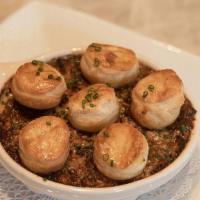 Escargot | Gfm · Six oven baked snails topped with onion-garlic stuffing, herb-garlic butter and puffed pastr...
