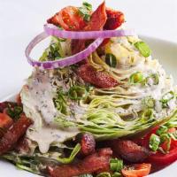 Wedge Salad | Gf · Wedge of crisp Iceberg lettuce, topped with our house buttermilk vinaigrette, grape tomatoes...