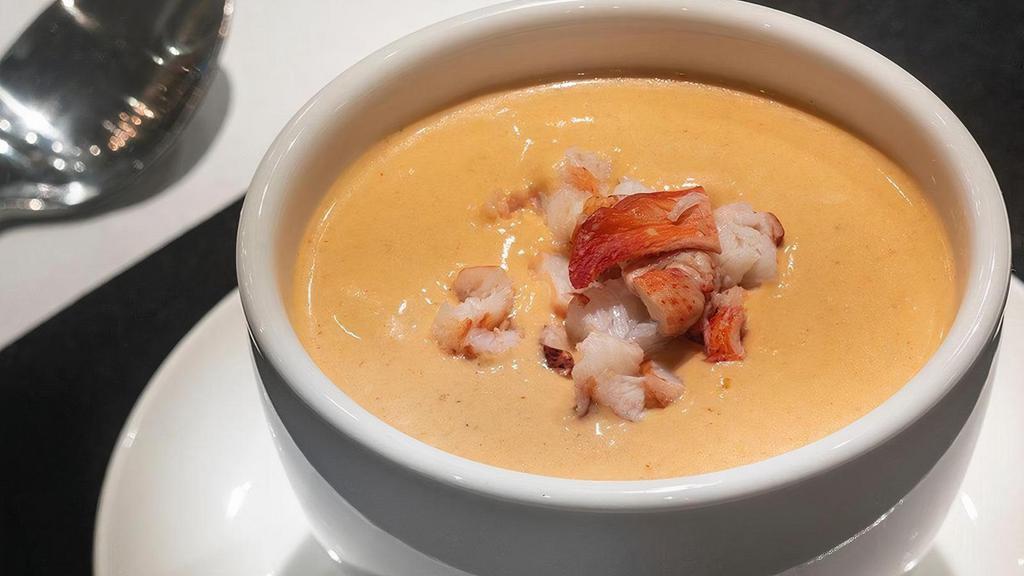 Lobster Bisque | Gf · Creamy lobster bisque served with diced lobster meat