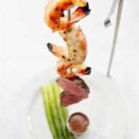 Symphony Kabob* | Gf · Six ounce filet mignon cut into two medallions, three grilled jumbo shrimp, two ounces of lo...
