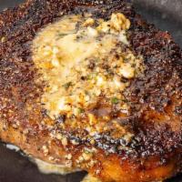 Prime Ribeye, 14 Oz* | Gf · 14 ounces. Seasoned with Perry's Signature Steak Seasoning, char-broiled and topped with cho...