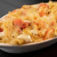 Lobster Mac & Cheese · Lobster meat sautéed in Alfredo sauce with Penne pasta. Topped with Monterey Jack cheese and...