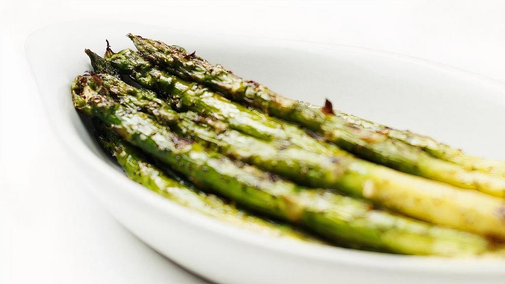 Steamed Or Grilled Asparagus | Gf, Ve · Fresh asparagus spears steamed or grilled, seasoned lightly with salt and pepper and tossed with our Buerre Fondue