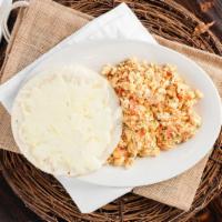 Huevos Pericos Y Arepa Con Queso · Scrambled eggs with diced tomato and onions, corn cake with cheese.