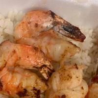 Grilled Jumbo Shrimp · Ten jumbo grilled shrimp served on a bed of rice  and two sides of choice and drink.