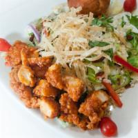 Buffalo Bleu Salad · We use nuts and nut based oils in this item. Buffalo chicken tenders, bacon, cheddar, crouto...