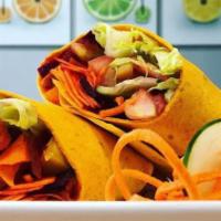 Vegan Blenders Wrap · Lettuce, tomatoes, cucumber, avocado, carrots, mushrooms, hummus and vegan patty.