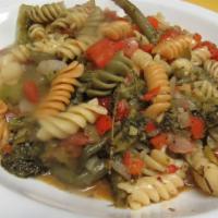 Irie Pasta · Reggae pasta, bell peppers, onions, diced tomatoes, garlic and thyme sauteed in balsamic vin...