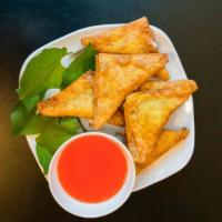 Crab Rangoon (6) · Our Crab Rangoons are handmade in house and deep fried to perfection.