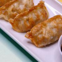 Gyozas · Steamed or fried pork dumpling with ponzu sauce.