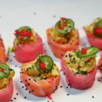 Boshi Roll · Salmon, tuna, krab salad, scallions, avocado, cucumber with white fish tartare, aji amarillo...