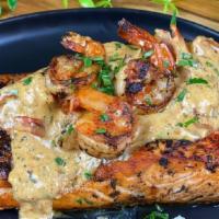 Bistro Blackened Salmon · Blackened salmon topped with Garlic butter shrimp, bistro sauce, over rice. Includes 2 sides...