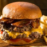 Bistro Burger · 2 1/4lb Wagyu beef patties, bacon, colby jack cheese, bistro sauce, mayo, toasted bun. Inclu...