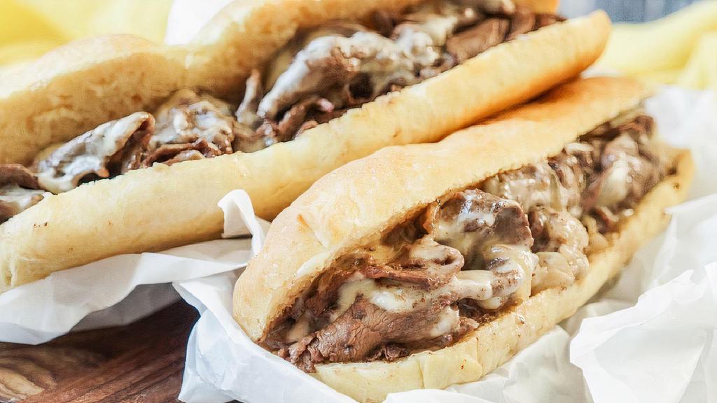 Bistro Cheese Steak · Angus steak, 3 cheese blend, onions, bistro sauce, mayo, toasted hoagie roll. Includes side of Fries.