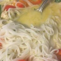 Thai Coconut Chicken Soup · Vermicelli, red peppers, scallions, and mushrooms in coconut chicken broth. Topped with Asia...