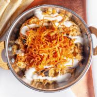 Kashk Bademjoon · Vegetarian. Fried eggplant, cream of whey crispy mint, fried onion.