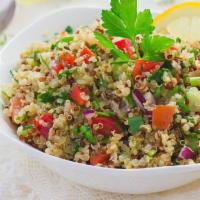 Tabouleh Salad · Bulger wheat, tomato, parlsey, lemon juice, and olive oil.