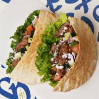 Beef & Lamb Gyro Pita · Mixed beef & lamb gyro with lettuce, tomatoes, onions, and your choice of sauce wrapped in a...