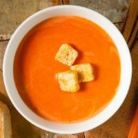 Tomato · Home-made creamy tomato soup topped with home-made croutons