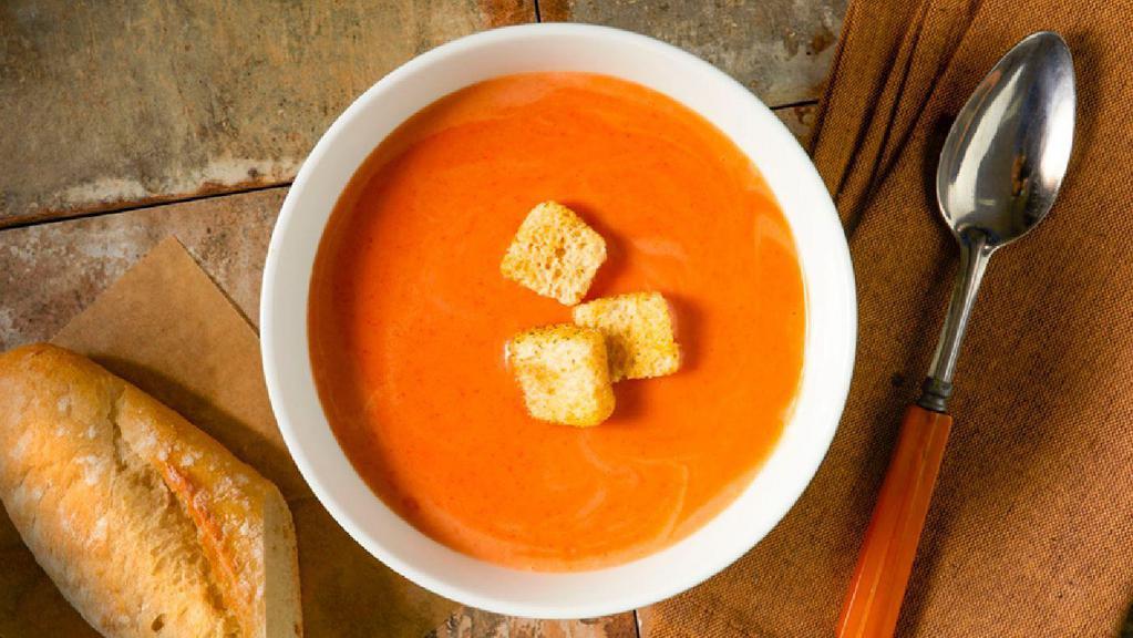 Tomato · Home-made creamy tomato soup topped with home-made croutons
