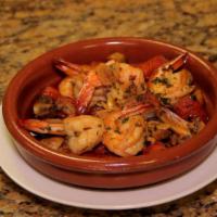 Paella Marinera · Mahi mahi, shrimp, scallop, calamari and mussle.