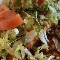 Enchiladas Suizas (3) · Chicken breast topped with the chef's special cheese tomatillo sauce, mixed greens, and whit...
