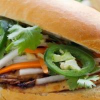 Banh Mi · Banh Mi served with homemade mayo, pate, pickled carrot/daikon, scallions, cilantro, and jal...