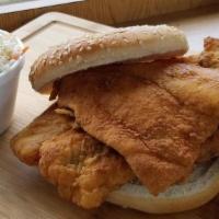 Haddock Sandwich · 3/4 lb Haddock Sandwich on a Jumbo Sesame Seed Bun with house recipe tartar sauce on the side