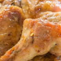 Honey Garlic Chicken Wings · 8 pieces. Served with wonton or egg drop soup, egg roll or a chicken wing, and pork fried ri...