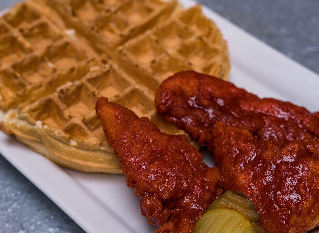 Nashville Hot · 3 each 100% Natural Chicken Tenders tossed in Spicy Cayenne & Black Pepper Sauce piled on a cooked to order Buttermilk Waffle, Pickle slices