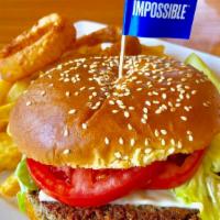 Impossible Burger · Look, cooks and taste like beef. Made from plants on sesame bum, served with lettuce, tomato...