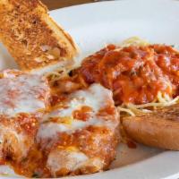 Chicken Parmigiana · Fried chicken cutlet, topped with tomato sauce and mozzarella cheese, baked to perfection, s...