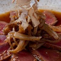 Tuna Spice* · Spicy. Seared tuna with seven spiced, white and red onion, ponzu sauce and fish flakes. Cons...