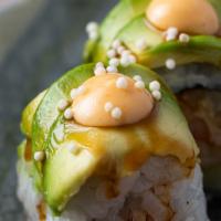 Dragon Roll · Shrimp tempura, cucumber inside out roll, topped with avocado, eel sauce and spicy mayo.