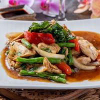 Thai Basil Sauce (Ka Prow) · Spicy. Basil leaves, bell pepper, fresh chili, green bean, minced garlic and onion.