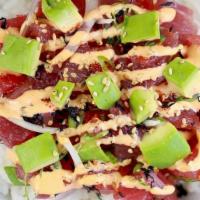 Spicy Tuna · Ahi Tuna, sweet onion, scallions, avocado, hijiki seaweed, masago, sesame seeds, and with sp...