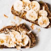Almond Butter Toast · Almond Butter Toast topped with your choice of either Sliced Bananas, Sliced Strawberries or...