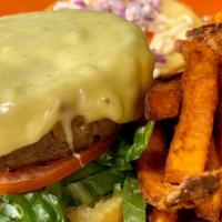 Beyond Vegan Burger · Brioche bun beyond burger vegan mayonnaise red onion lettuce tomato vegan cheese and  side o...