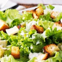 Caesar Salad · Classic caesar salad. Crisp romaine, croutons, and grated Parmesan are tossed with tradition...