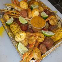 Family Night · Includes: 6 Crab Leg Clusters, 2 lb Shrimp, 2 lb Sausage, 4 Corns, 6 Red Skin Potatoes and 6...