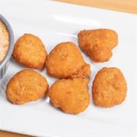 Mac ＆ Cheese Bites (6 Pcs) · Baked bite size macaroni pasta in a cheese sauce.