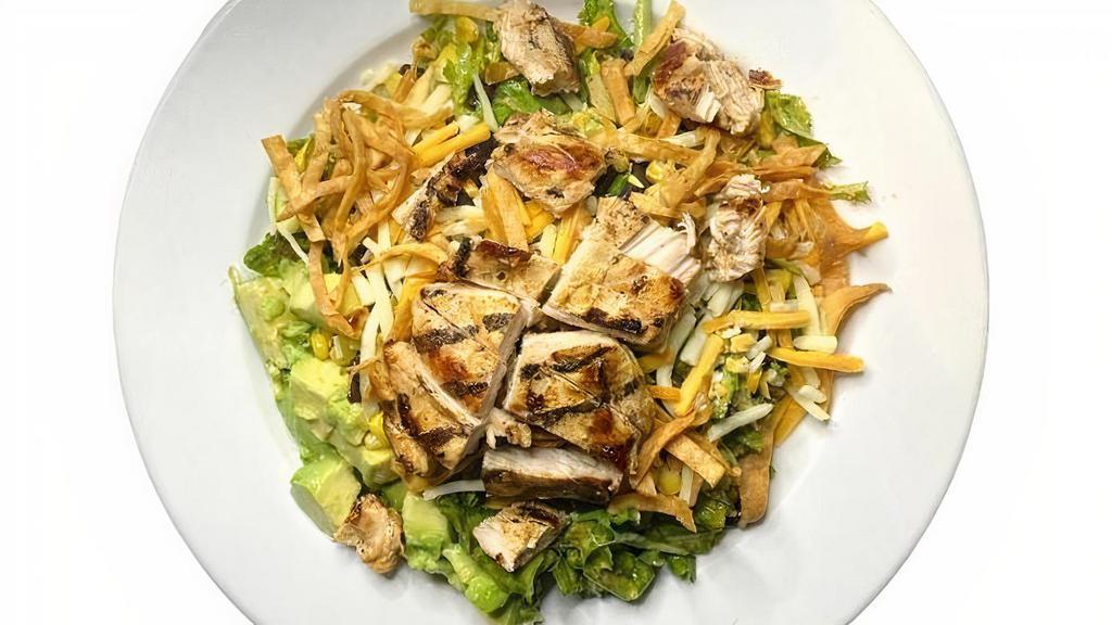 Southwest Chicken · Marinated chicken, black beans, roast corn, avocado chunks. and shredded cheese. Served on mixed greens tossed with. our cilantro-peanut vinaigrette and topped with shredded. crunchy tortilla strips.