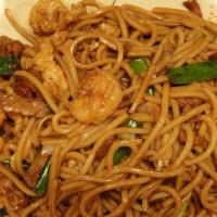 House Special Chow Fun · Long flat rice noodles (pork, shrimp, and chicken).