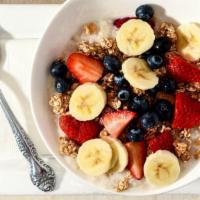 Oatmeal & Fresh Fruits · Vegetarian. Oatmeal, granola, banana, strawberries, blueberries, and honey.